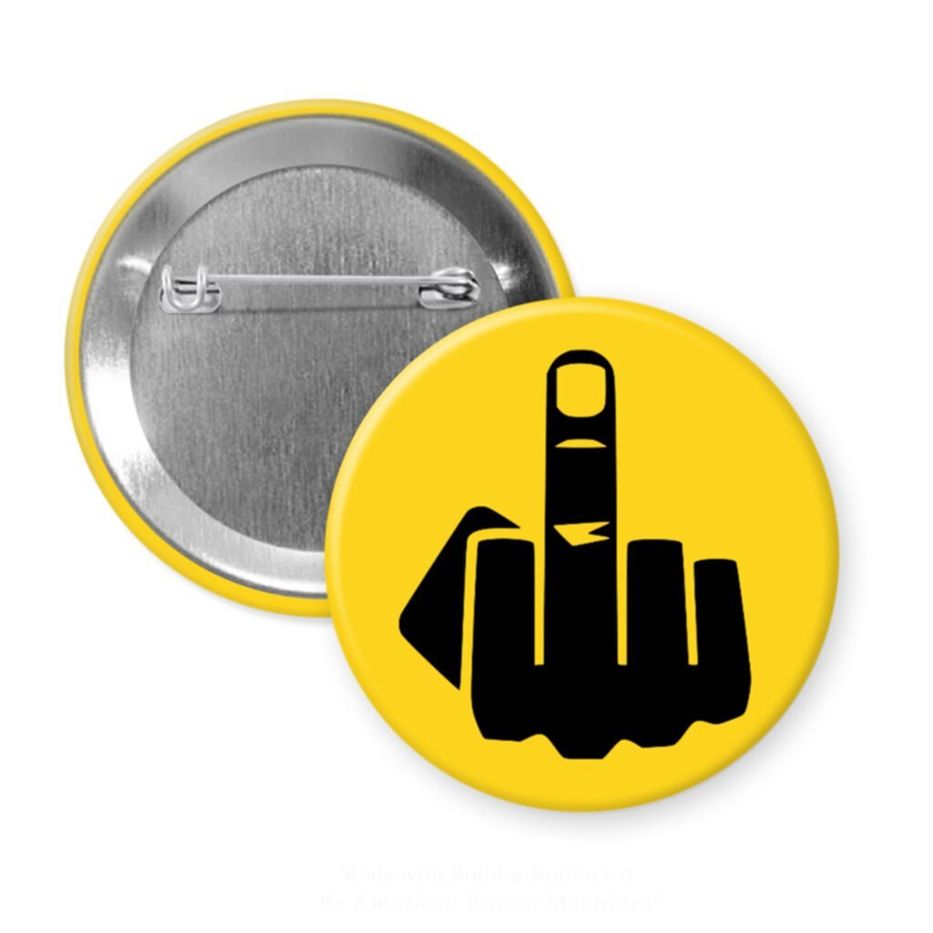 Yellow pinback button with silhouette of middle finger printed in black.