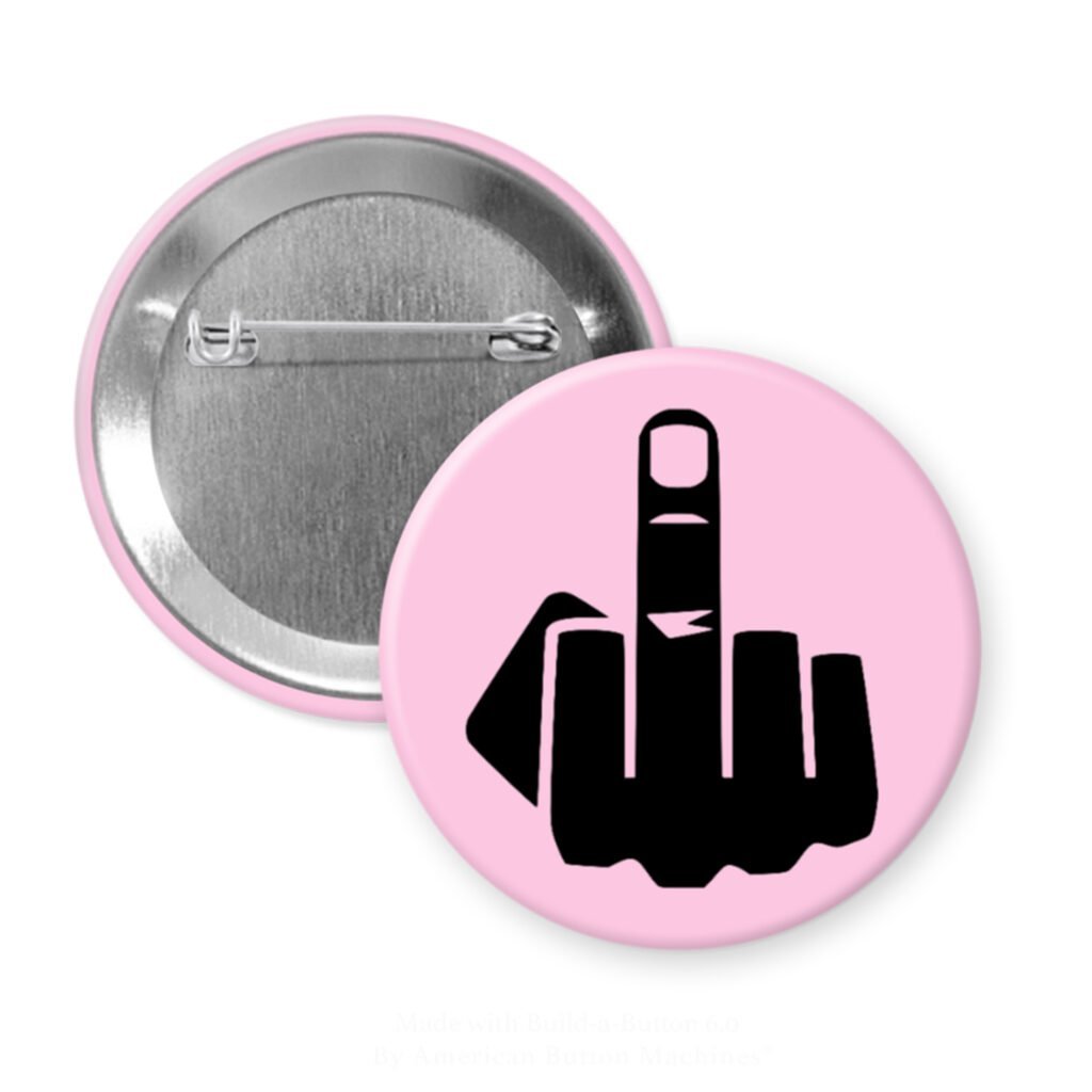 Pink pinback button with silhouette of middle finger printed in black.