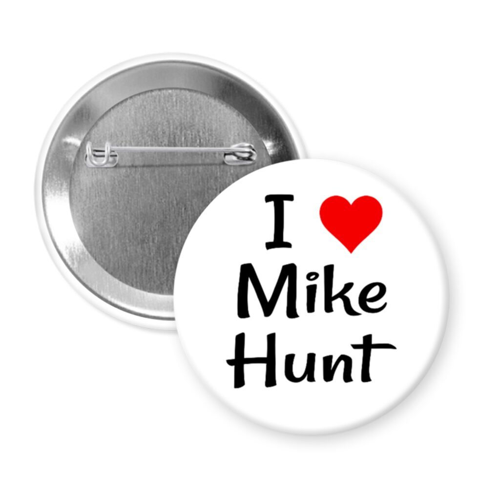 White pinback button with the text 'I ❤ Mike Hunt' printed on it.