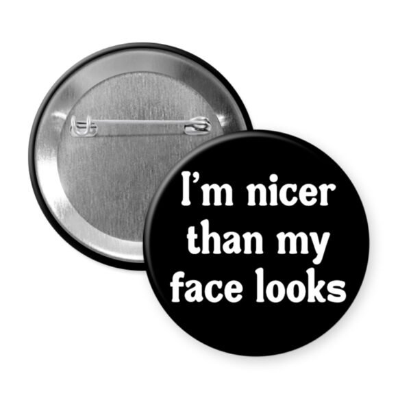 Black button that says "I'm nicer than my face looks"