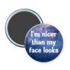 Galaxy print magnet that says "I'm nicer than my face looks"