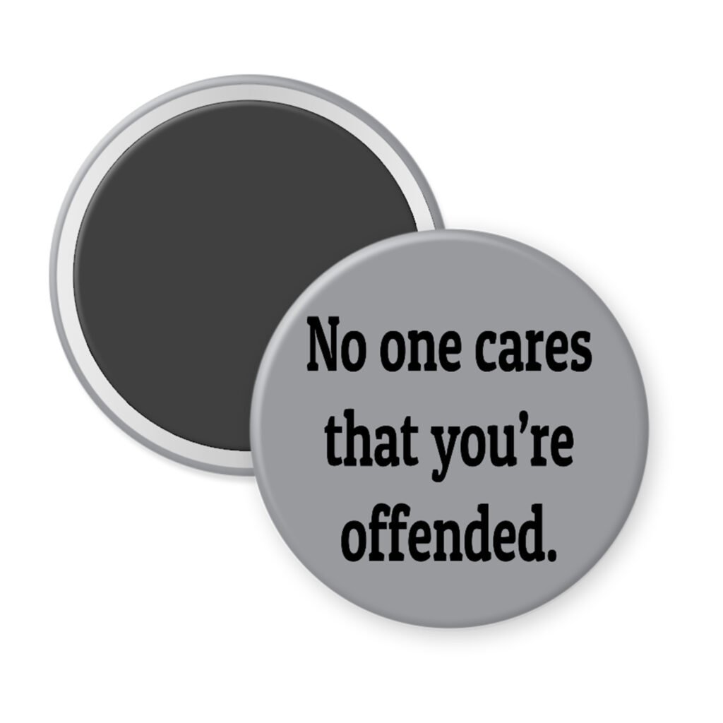 Grey magnet with the text 'No one cares that you're offended.' printed in black.