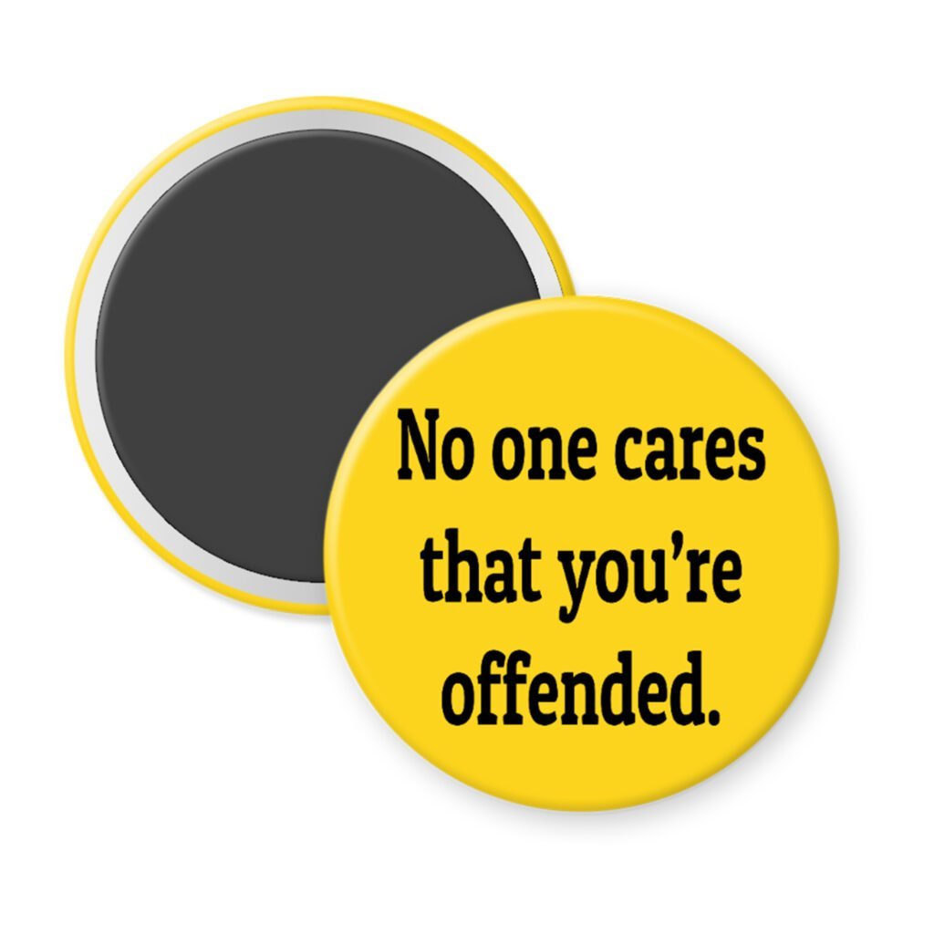 Yellow magnet with the text 'No one cares that you're offended.' printed in black.