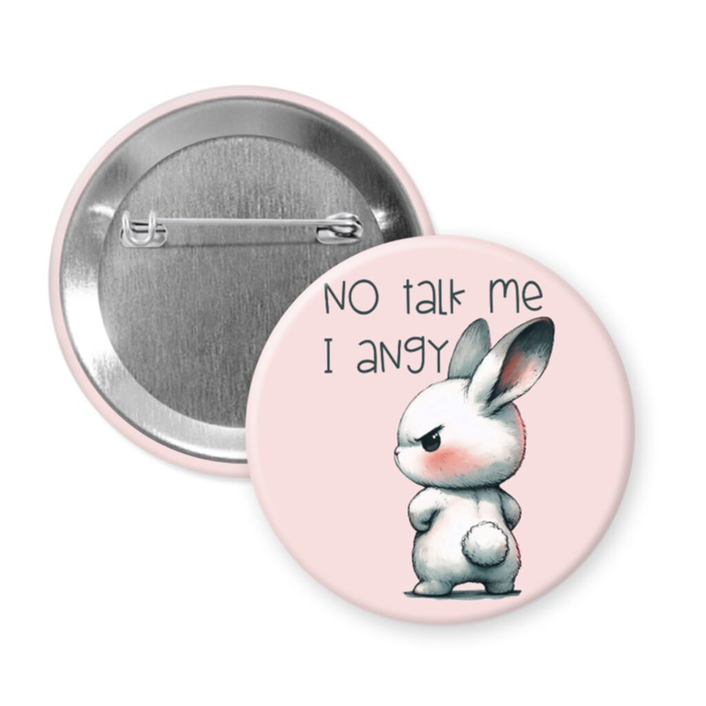 Button badge with a cartoon rabbit and text 'No talk me I angy' on a pink background.