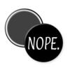 Black magnet that says "NOPE".