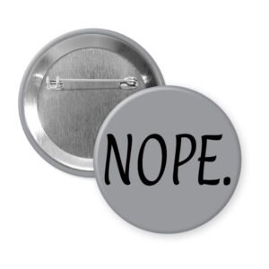 Grey pinback button with the text 'NOPE.' printed in black.