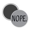 Grey magnet with the text 'NOPE.' printed in black.