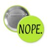 Green pinback button with the text 'NOPE.' printed in black.