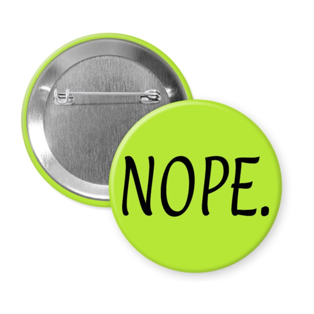Green pinback button with the text 'NOPE.' printed in black.