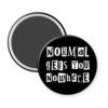 Black magnet that says "Normal gets you nowhere".