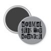 Grey magnet with the text "Normal gets you nowhere" printed in black stencil graffiti font.