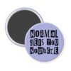 Purple magnet with the text "Normal gets you nowhere" printed in black stencil graffiti font.