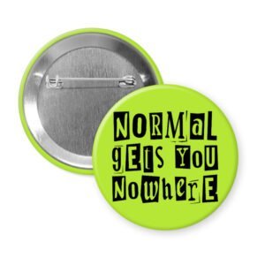 Green pinback button with the text "Normal gets you nowhere" printed in black stencil graffiti font.