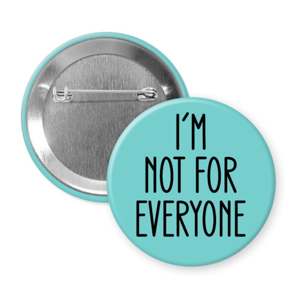 Blue pinback b utton with the text 'I'm not for everyone' printed in black.