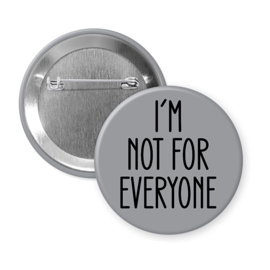 Grey pinback button with the text 'I'm not for everyone' printed in black.