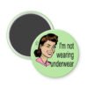 Magnet with a cartoon illustration of a woman and text 'I'm not wearing underwear' on a light green background.