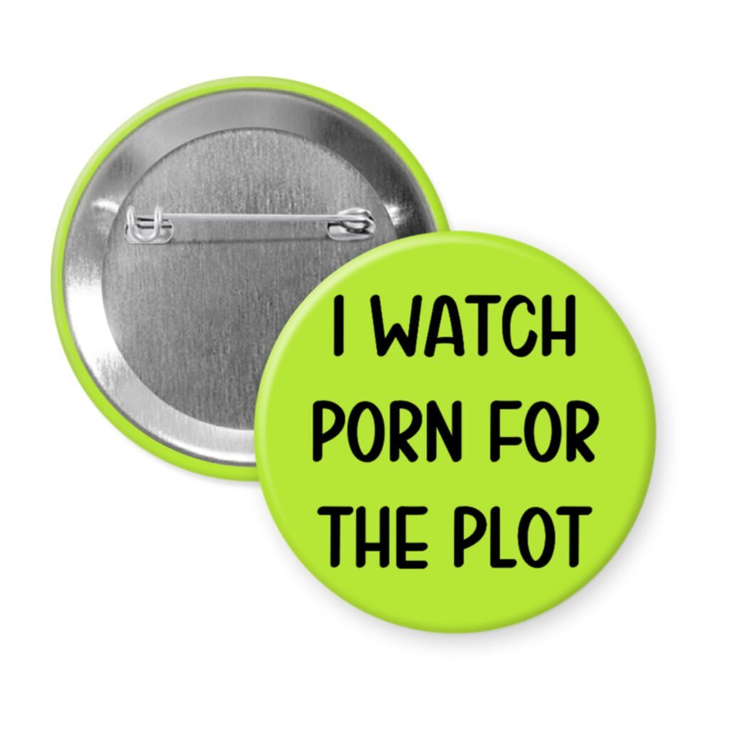 Green pinback button with the text 'I watch porn for the plot' printed in black.