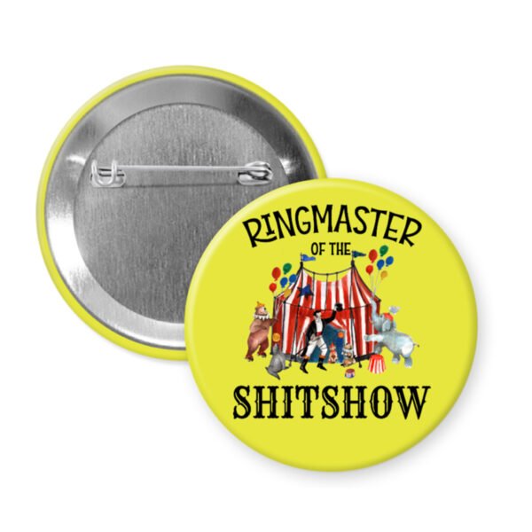 Yellow pinback button with circus graphics and the phrase Ringmaster of the Shitshow.