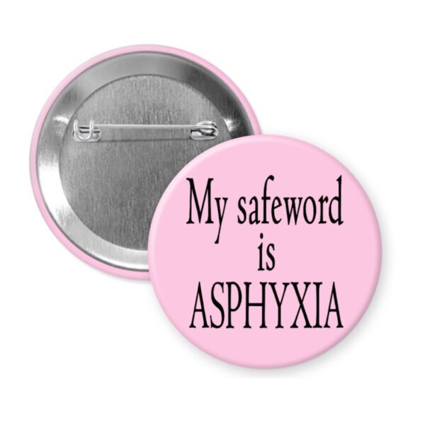 Pink pinback button with the text 'My safeword is asphyxia' printed in black.