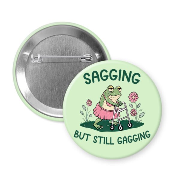 Button badge with a frog character and text 'Sagging but still gagging' on a light green background.