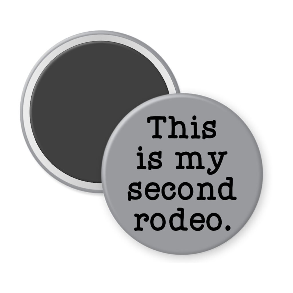 Grey magnet with the text 'This is my second rodeo.' printed in black.