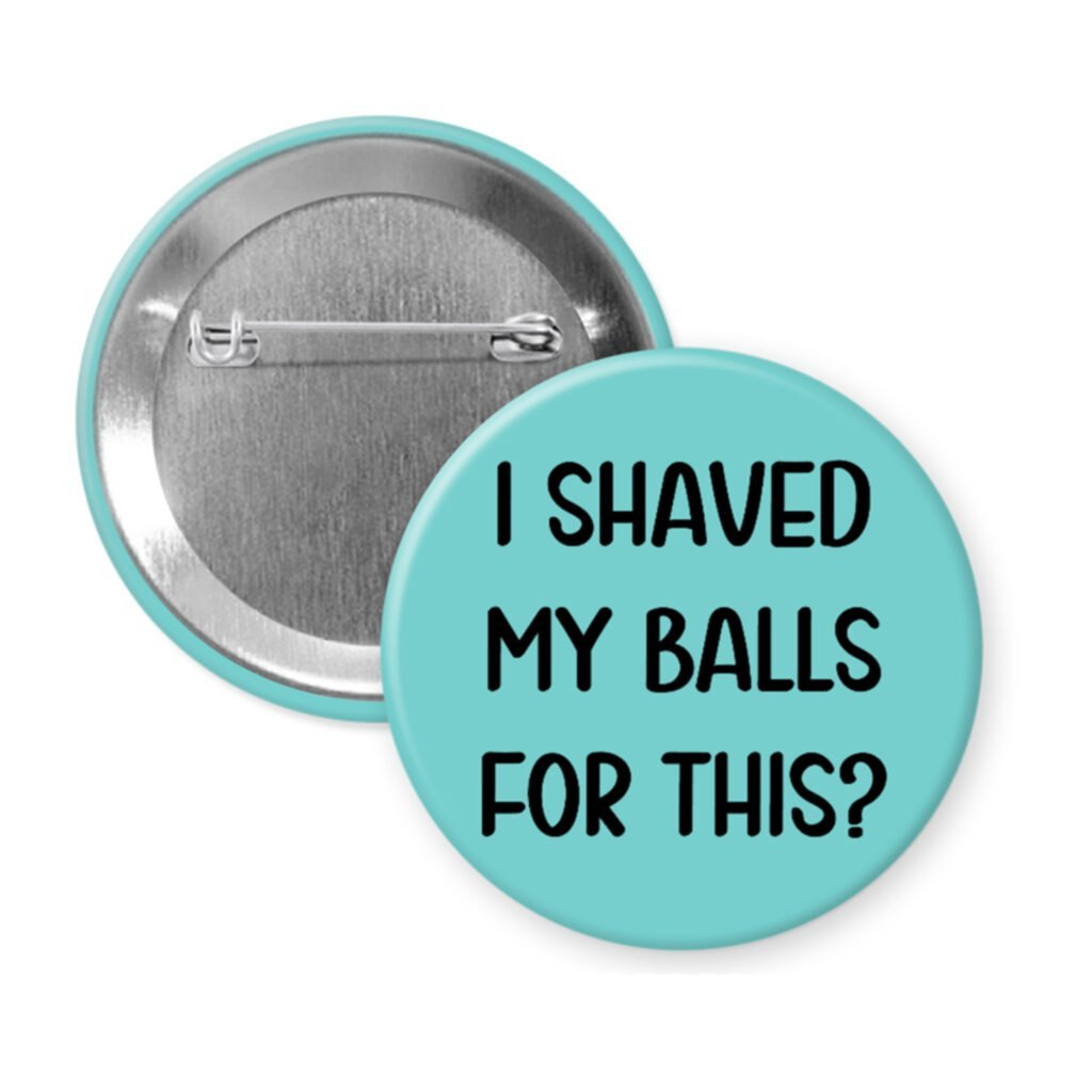 Blue pinback button with text 'I Shaved My Balls For This?' printed in black.