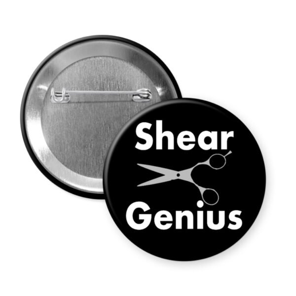 Black button with image of hair cutting shears and the words "Shear Genius".