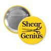 Yellow pinback button with an image of haircutting shears and the text 'Shear Genius' printed in black.