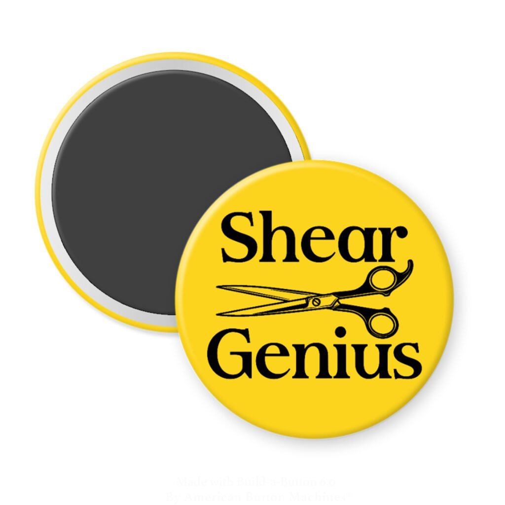 Yellow magnet with an image of haircutting shears and the text 'Shear Genius' printed in black.