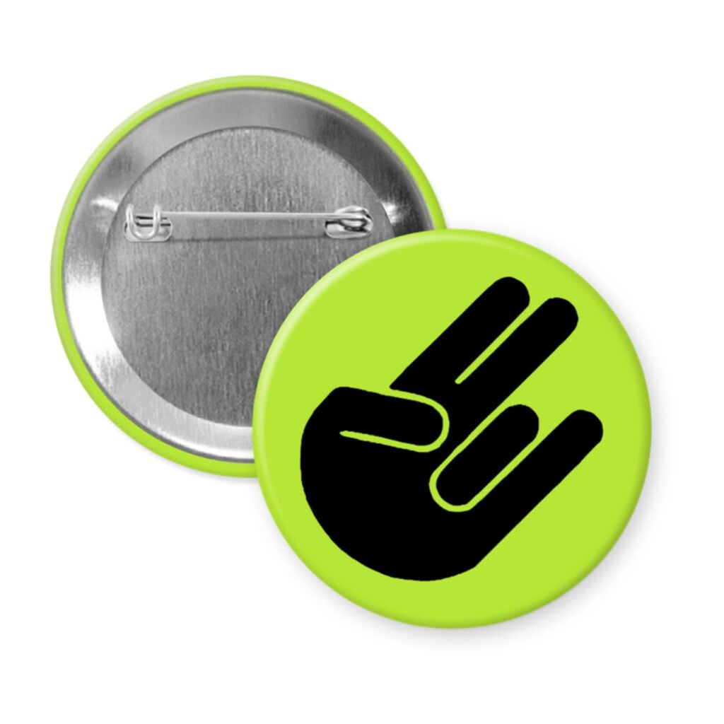 Green pinback button with the shocker hand gesture printed in black.