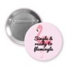 Button badge with pink flamingo design and text 'Single & ready to flamingle'.
