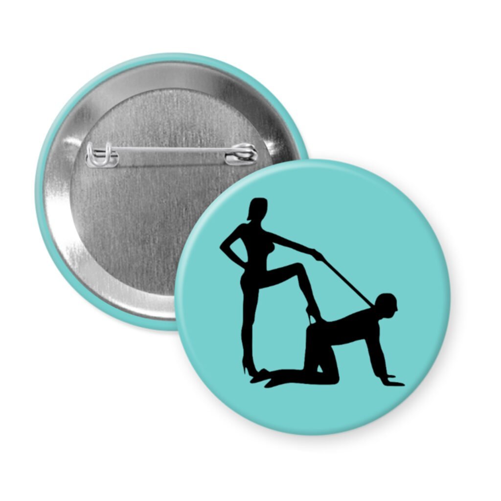 Blue pinback button with silhouette image of a man on his hands and knees and a dominatrix holding his leash.