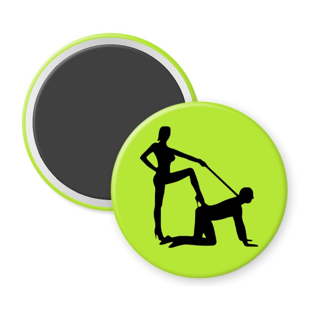 Green magnet with silhouette image of a man on his hands and knees and a dominatrix holding his leash.