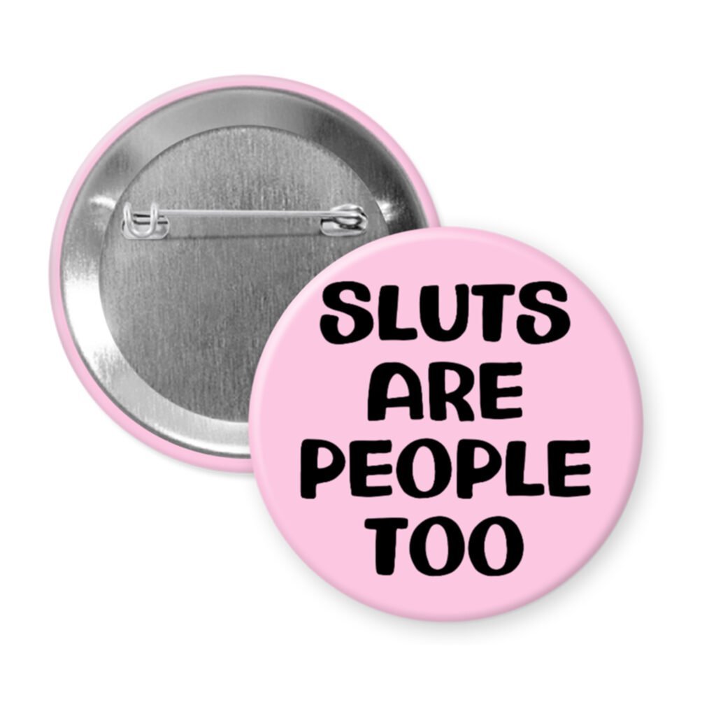 Light pink pinback button with the text 'Sluts are people too' printed in black.
