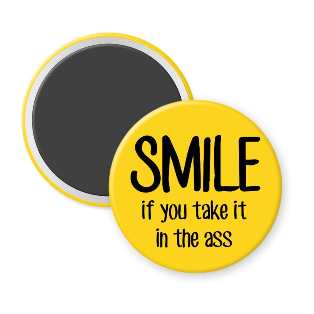 Yellow magnet with the text 'SMILE if you take it in the ass' printed in black.