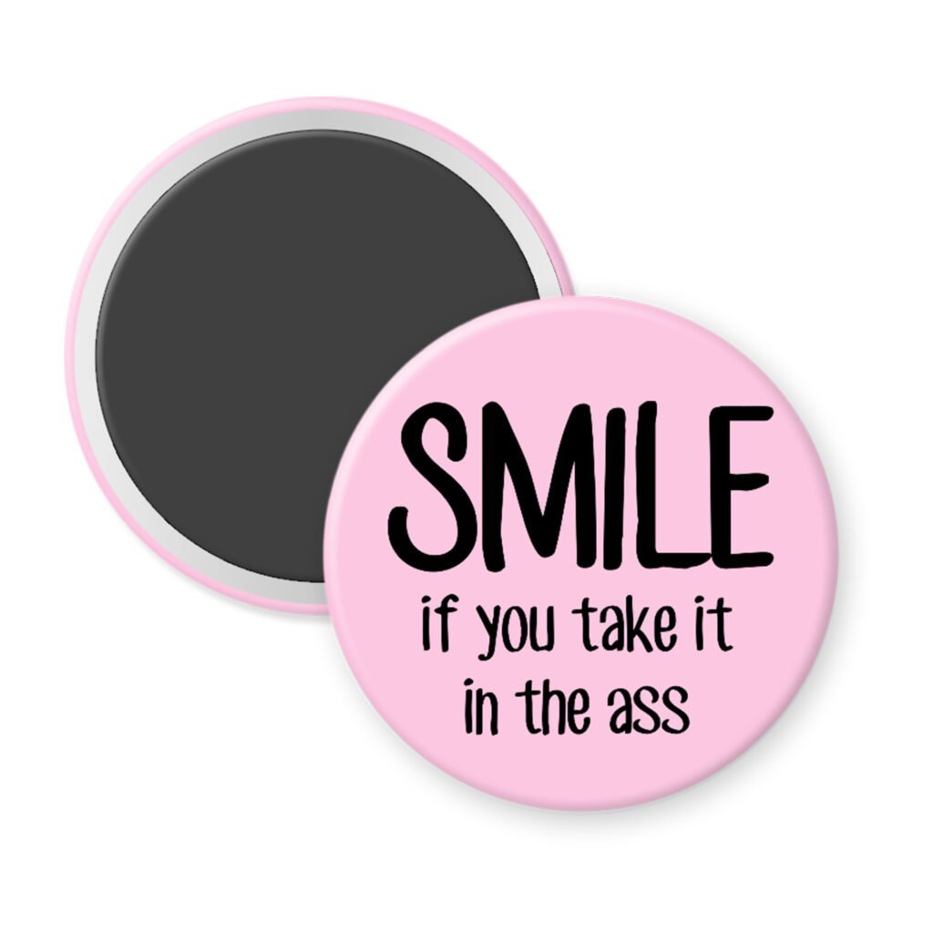 Pink magnet with the text 'SMILE if you take it in the ass' printed in black.