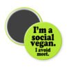 Green magnet with the text 'I'm a social vegan. I avoid meet.' printed in black.
