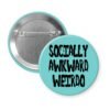 Blue pinback button with the text 'Socially awkward weirdo' printed in black drippy font.