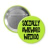 Green pinback button with the text 'Socially awkward weirdo' printed in black drippy font.