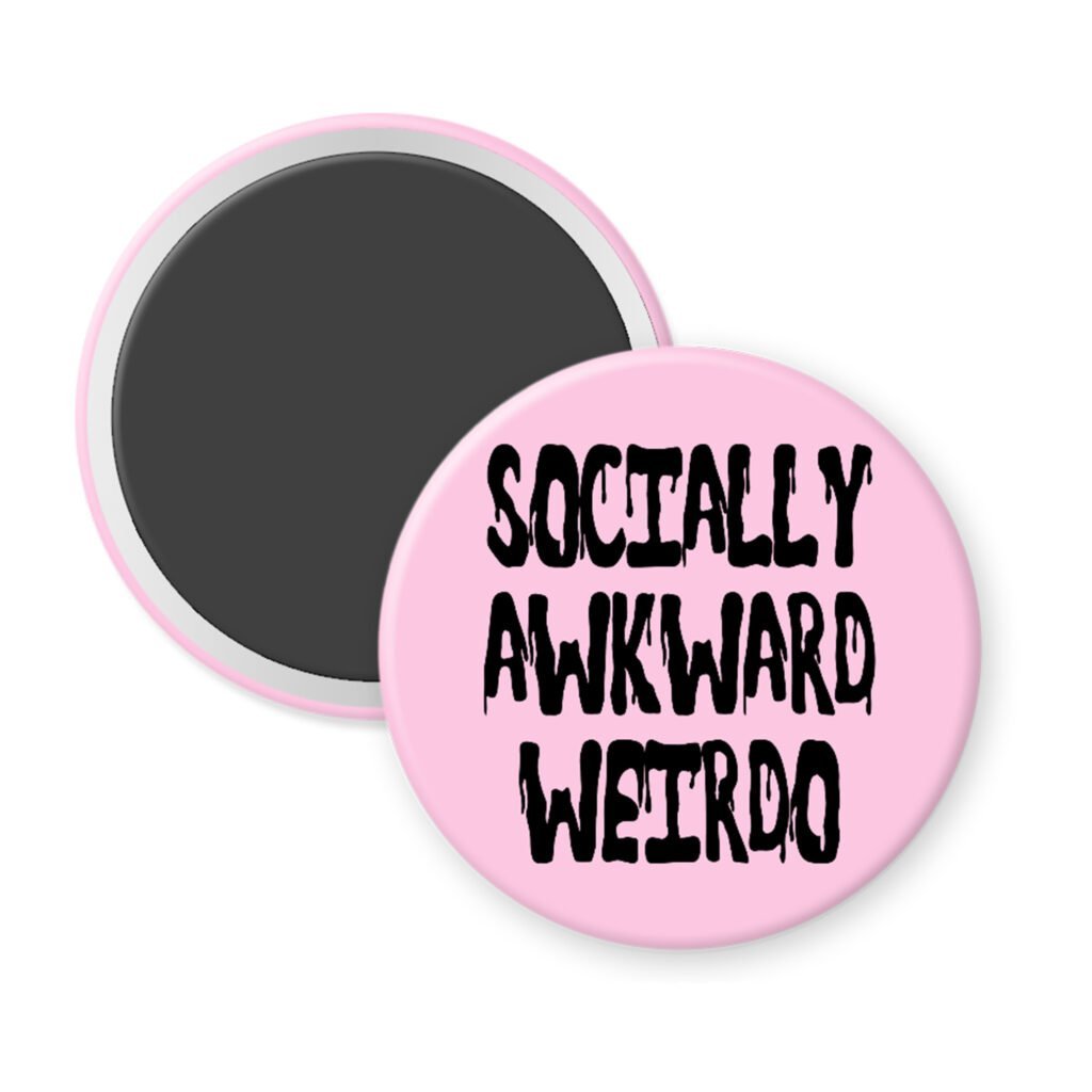 Pink magnet with the text 'Socially awkward weirdo' printed in black drippy font.