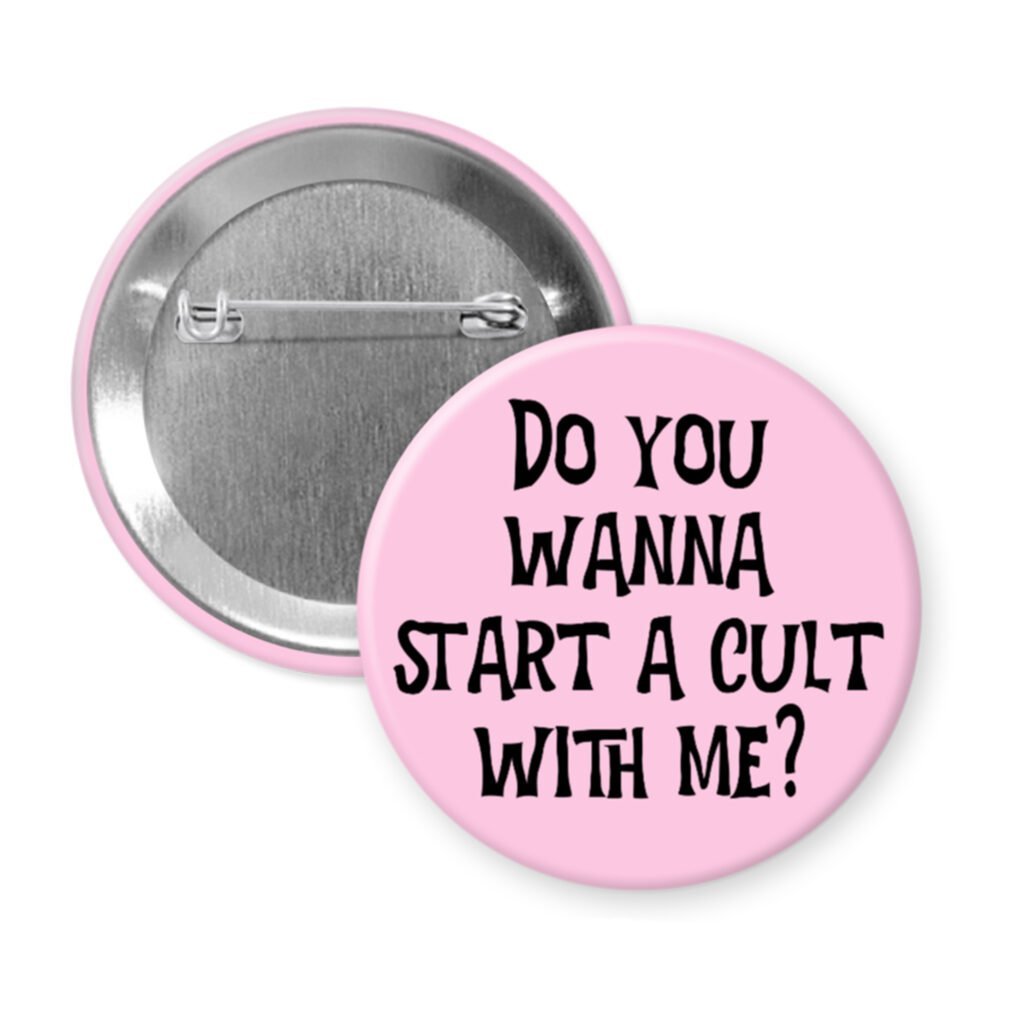 Pink pinback button pinback button with the text 'Do you wanna start a cult with me?' printed in black.