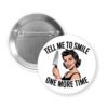 Button with image of a woman holding a knife and the phrase "Tell me to smile one more time"