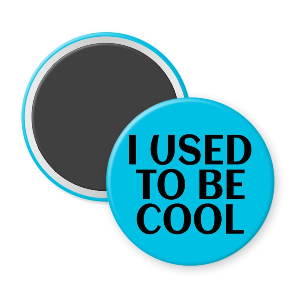 Blue magnet with the text 'I USED TO BE COOL' printed in black.