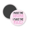 Pink magnet with text 'I HAVE THE VAGINA I MAKE THE RULES".
