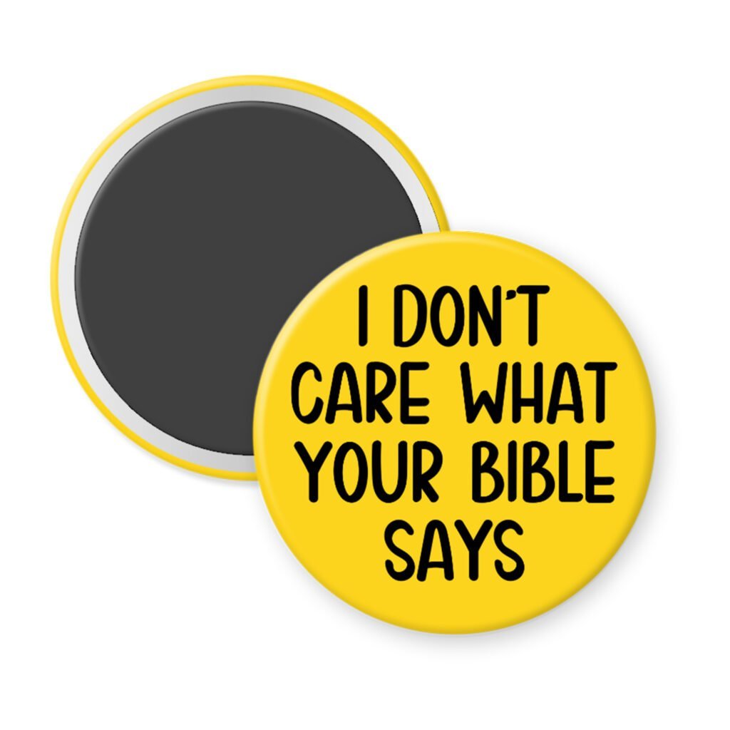 Yellow magnet with the text 'I don't care what your bible says' printed in black.