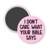 Pink magnet with the text 'I don't care what your bible says' printed in black.