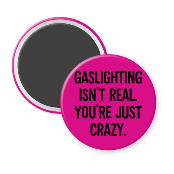 Pink magnet with the text 'Gaslighting isn't real. You're just crazy' in black distressed text.