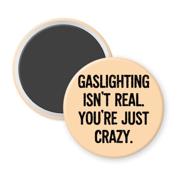 Peach magnet with the text 'Gaslighting isn't real. You're just crazy' in black distressed text.