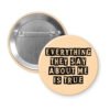 Peach color button with the text 'Everything they say about me is true' in black display font'