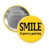 Yellow button with the text 'SMILE if you're a good boy' printed in black.